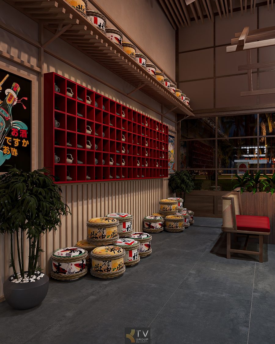 Không gian nội thất JAPAN BBQ được thiết kế theo phong cách Nhật Bản truyền thống với hệ tủ trưng bày ly sứ, trống sake trang trí và chất liệu gỗ chủ đạo. Sự kết hợp hài hòa giữa ánh sáng ấm, vật liệu tự nhiên và chi tiết decor đặc trưng mang đến không gian ẩm thực tinh tế, ấm cúng và đậm bản sắc Nhật Bản.