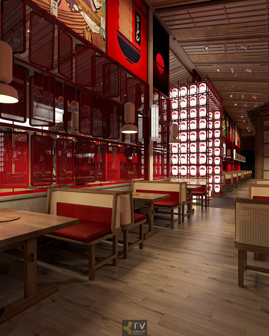 Không gian bàn ghế gỗ và đệm đỏ trong nhà hàng Japan BBQ với vách trang trí đỏ nổi bật