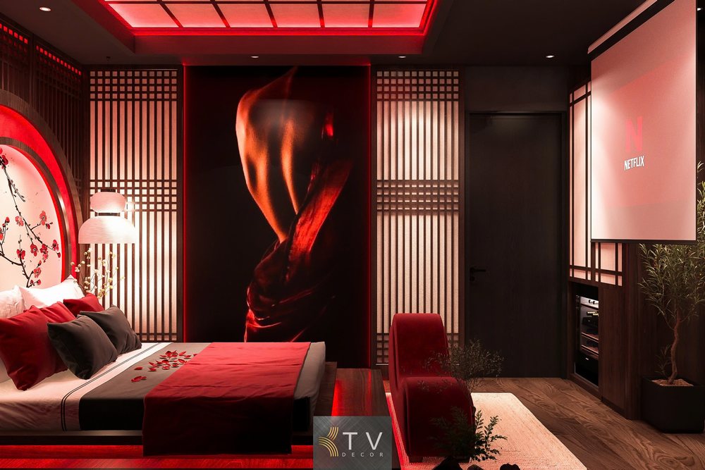 Phòng ngủ khách sạn tình yêu với tranh nghệ thuật khổ lớn, ánh sáng đỏ huyền bí, giường đôi sang trọng và màn chiếu Netflix – thiết kế bởi KTV Decor