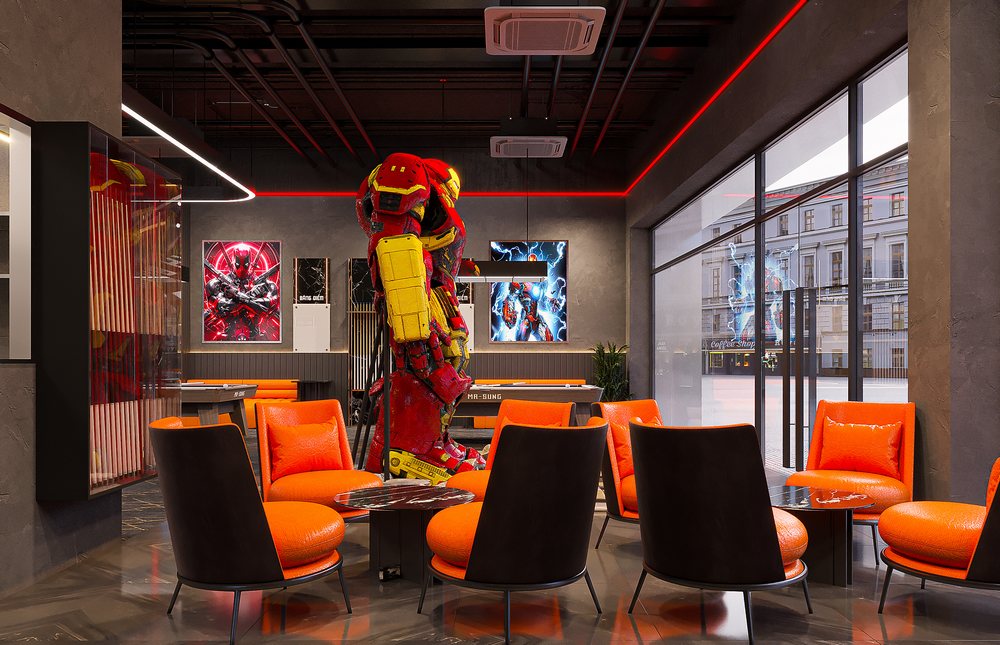 Không gian tầng trệt Club Narra Billiards với ghế cam nổi bật, tượng Hulkbuster và tranh decor phong cách điện ảnh