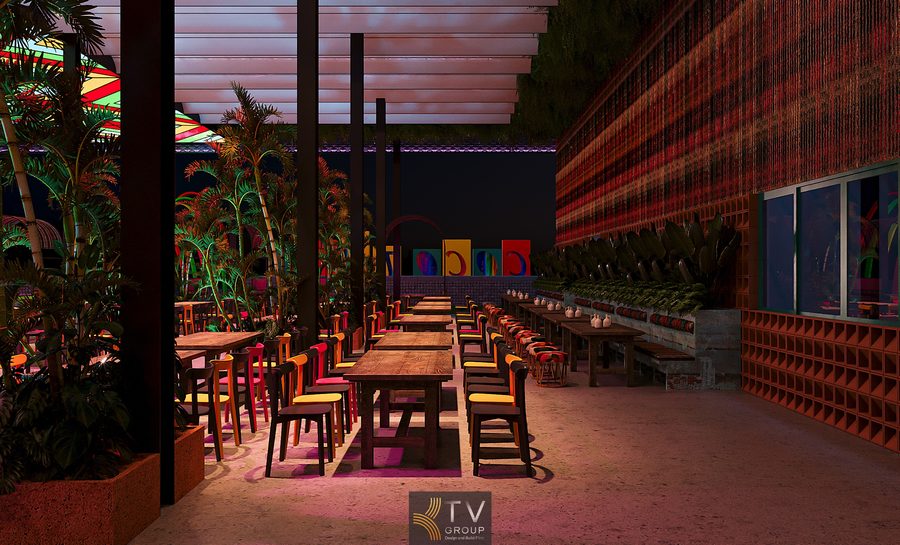 Thiết kế phong cách Thái trong nhà hàng Garden nổi bật bởi sự hòa trộn giữa màu sắc mạnh, thiết kế mái geometric rực rỡ và những bộ đệm họa tiết truyền thống. Ánh đèn hồng kết hợp không gian cây xanh tạo sự hài hòa giữa hiện đại và thiên nhiên, mang đến trải nghiệm thị giác đầy cảm xúc. 