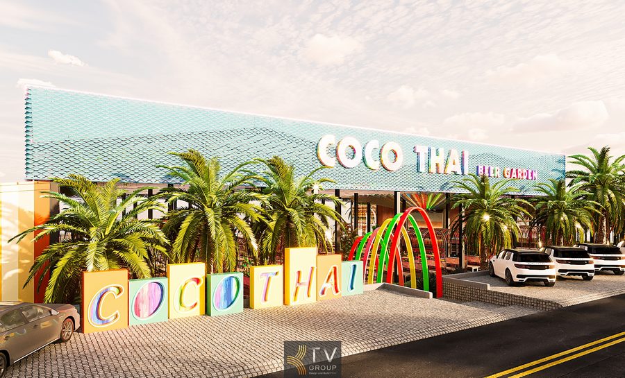Phong cách thiết kế COCO THAI Beer Garden chú trọng hiệu ứng ánh sáng, với bảng chữ lớn phủ sắc cầu vồng cùng vòm cong chiếu LED chạy dài. Hai hàng cọ xanh bố trí hai bên tăng chiều sâu cho không gian. Mặt tiền cuốn hút về đêm, tạo dấu ấn khác biệt giúp nhà hàng nổi bật giữa khu vực. 