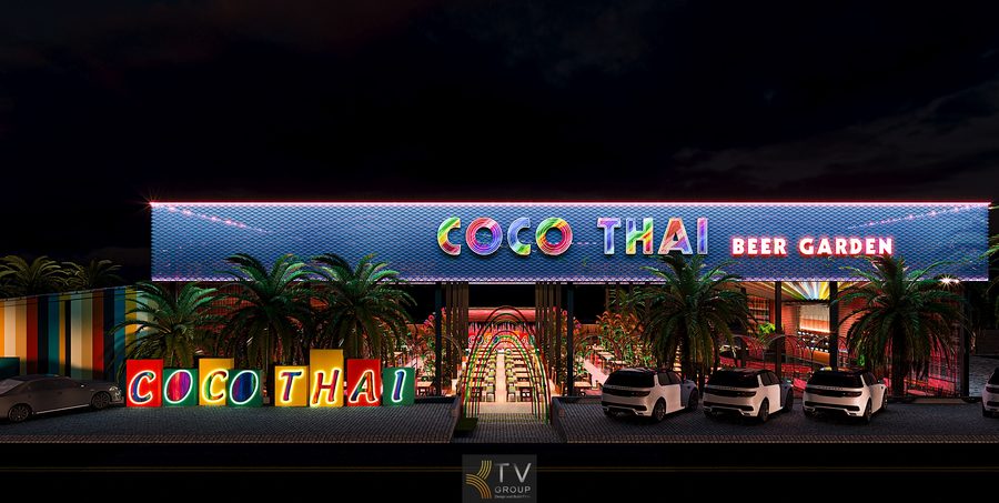 Nhà hàng COCO THAI Beer Garden gây ấn tượng mạnh với mặt tiền rực rỡ sắc màu, bảng hiệu neon nổi bật và lối vào dạng vòm ánh sáng hiện đại. Không gian được bao quanh bởi hàng cọ nhiệt đới, tạo cảm giác trẻ trung, sôi động và đậm chất Thái Lan. Thiết kế tập trung vào trải nghiệm thị giác, giúp nơi đây trở thành điểm check-in “hot” vào ban đêm. 