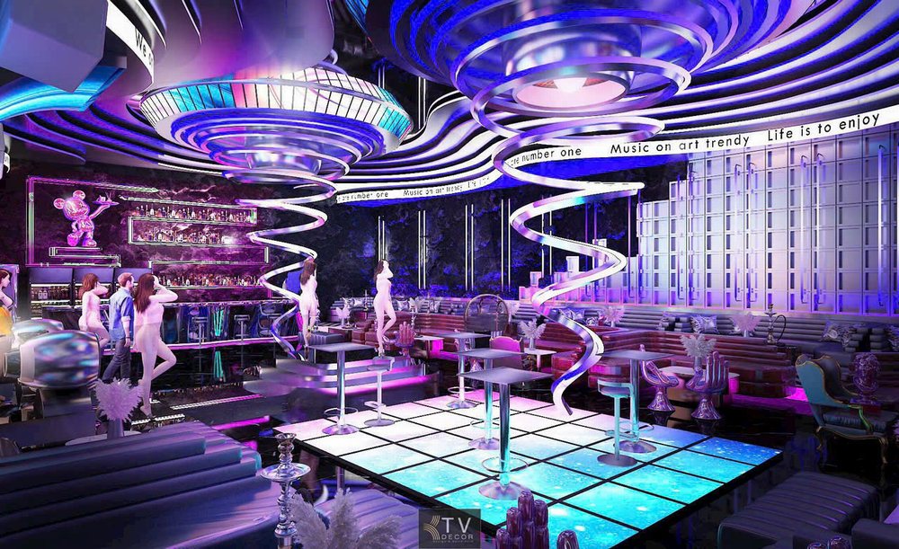 KTV DECOR thiết kế khu vực trung tâm quán bar với sàn LED tương tác, trần spiral nghệ thuật độc bản, setup hoàn chỉnh hệ thống ánh sáng và công năng vận hành bar chuyên nghiệp.