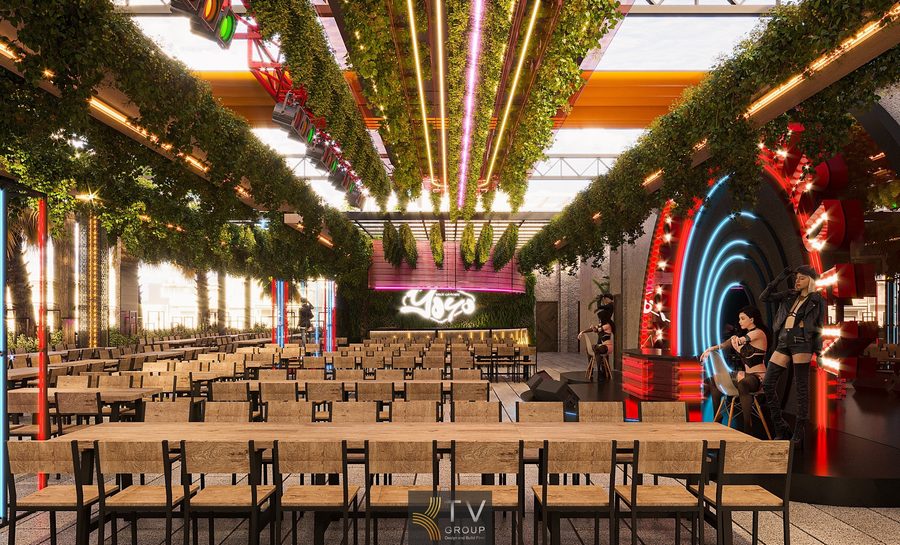 Khu Beer Garden ngoài trời với dàn đèn màu và cây xanh thả trần. Nhà hàng Beer Garden thiết kế thoáng sáng với nhiều hàng bàn dài. Beer Garden phong cách hiện đại với hệ đèn LED trang trí nổi bật.