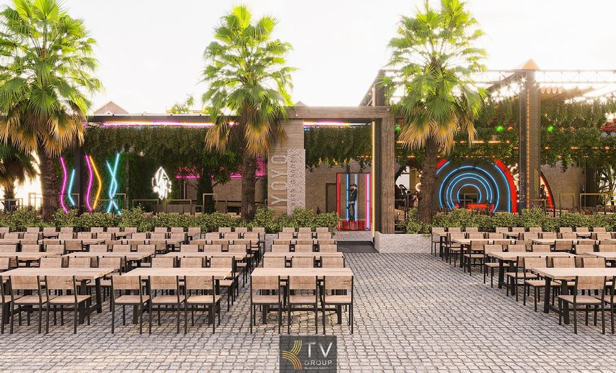 Nhà hàng Beer Garden rộng thoáng với hệ thống đèn LED và cây treo.