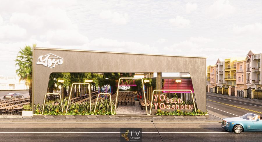 Thiết kế Beer Garden hiện đại với bàn gỗ xếp thẳng hàng, ánh sáng sân khấu đa sắc và mảng xanh treo tạo không gian thư giãn thoáng đãng.