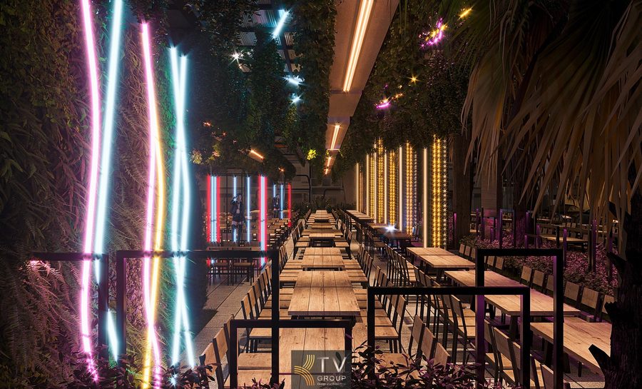 Không gian Beer Garden được thiết kế thi công theo phong cách hiện đại với hệ ánh sáng LED đa sắc, bố trí bàn dài tối ưu công suất và mảng xanh treo tạo trải nghiệm thoáng – chất – đậm tinh thần giải trí ngoài trời.