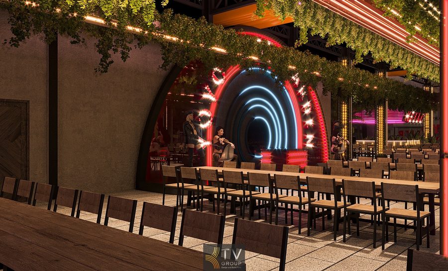 Không gian Beer Garden được thiết kế thi công với kiến trúc mở, điểm nhấn là cổng LED đa tầng màu sắc ấn tượng, mảng xanh thả trần và bố trí bàn ghế rộng rãi, mang lại trải nghiệm giải trí – ẩm thực hiện đại, thu hút khách.