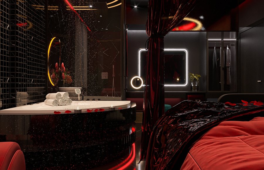 Thiết kế thi công nội thất phòng khách sạn sắc đỏ sang trọng với giường canopy, ánh sáng ấm và bồn tắm thư giãn liền kề không gian nghỉ ngơi
