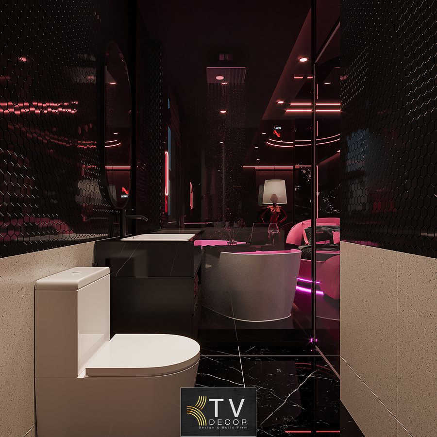 Hệ thống đèn LED neon hồng tạo hiệu ứng ánh sáng lạ mắt và thu hút. Giường tròn trung tâm kết hợp bố trí không gian mở hiện đại.