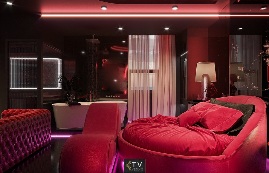 Không gian được thiết kế cho các cặp đôi, nổi bật với bồn tắm đôi, sofa nhung đỏ và gương neon “Good vibes” tạo mood đầy cảm xúc.
