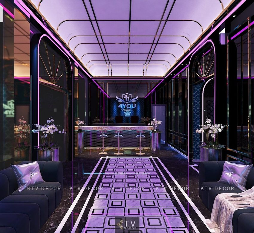 Thiết kế thi công karaoke tại Bình Dương sảnh lễ tân hiện đại ánh sáng tím