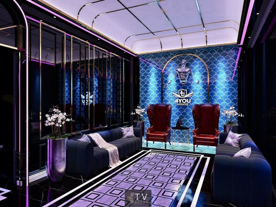 Thiết kế thi công karaoke tại Bình Phước phong cách hiện đại, phối màu ánh tím – xanh cá tính, nội thất cao cấp và không gian ấn tượng.