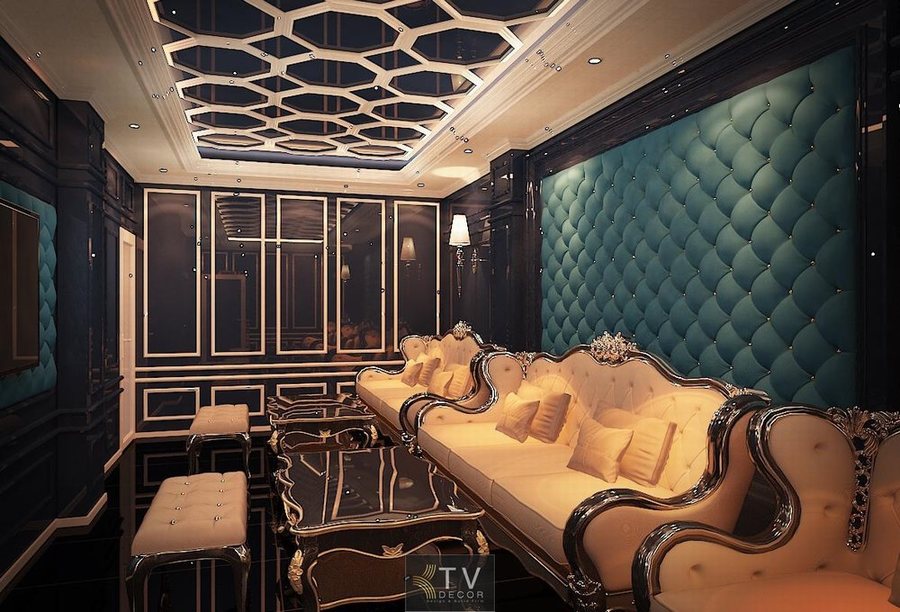 Thiết kế thi công karaoke tại Long An phong cách tân cổ điển, nội thất sang trọng, tường bọc da xanh ngọc và sofa cao cấp.
