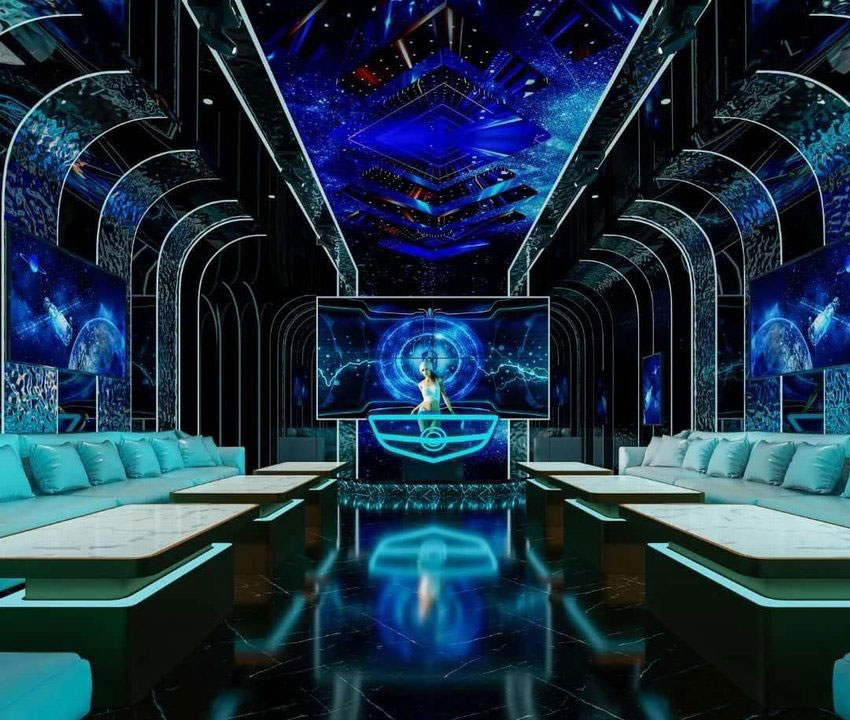 Thiết kế thi công karaoke phong cách công nghệ vũ trụ, trần LED ảo ảnh, màn hình hologram và nội thất hiện đại mang đến không gian giải trí đẳng cấp. 