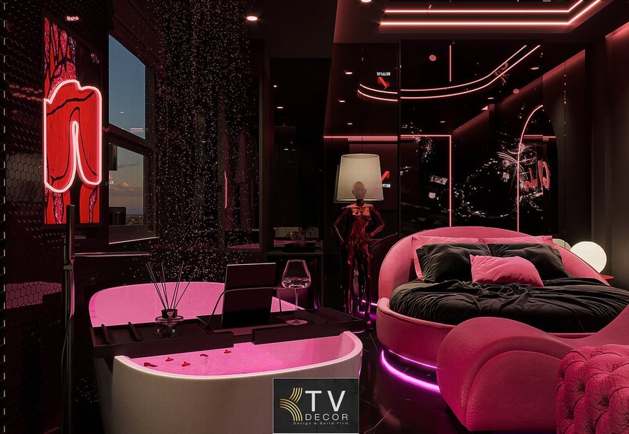 thiết kế phòng khách sạn tình yêu Long An phong cách đen hồng sexy với giường tròn và bồn tắm trong phòng