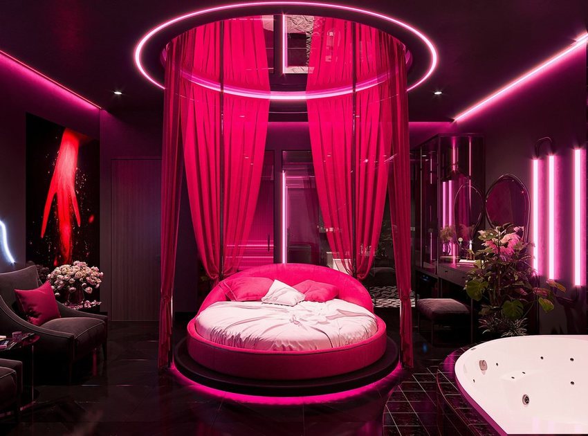 Thiết kế thi công khách sạn và khách sạn tình yêu tại Vũng Tàu với giường tròn, ánh sáng LED hồng tím, nội thất lãng mạn