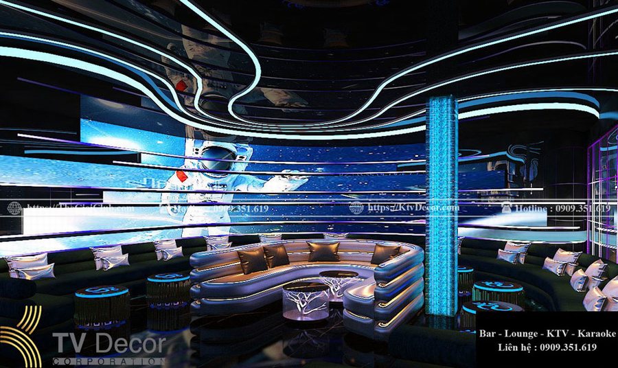 Thiết kế thi công karaoke tại TPHCM phong cách vũ trụ với màn hình LED 360 độ và nội thất hiện đại, ánh sáng trần mềm mại.