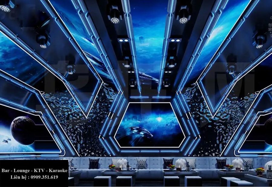 Thiết kế thi công karaoke tại TPHCM phong cách không gian vũ trụ, trần tổ ong LED kết hợp màn hình galaxy hiện đại.