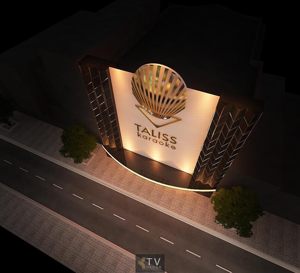 Mặt tiền karaoke Taliss thiết kế hiện đại với ánh sáng vàng sang trọng Thiết kế bảng hiệu karaoke Taliss nổi bật phong cách nightlife