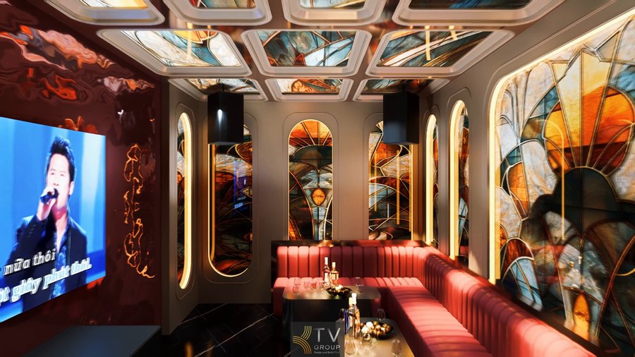 Thiết kế phòng karaoke KTV sang trọng với sofa bọc da đỏ, tường kính nghệ thuật và hệ thống ánh sáng hiện đại.