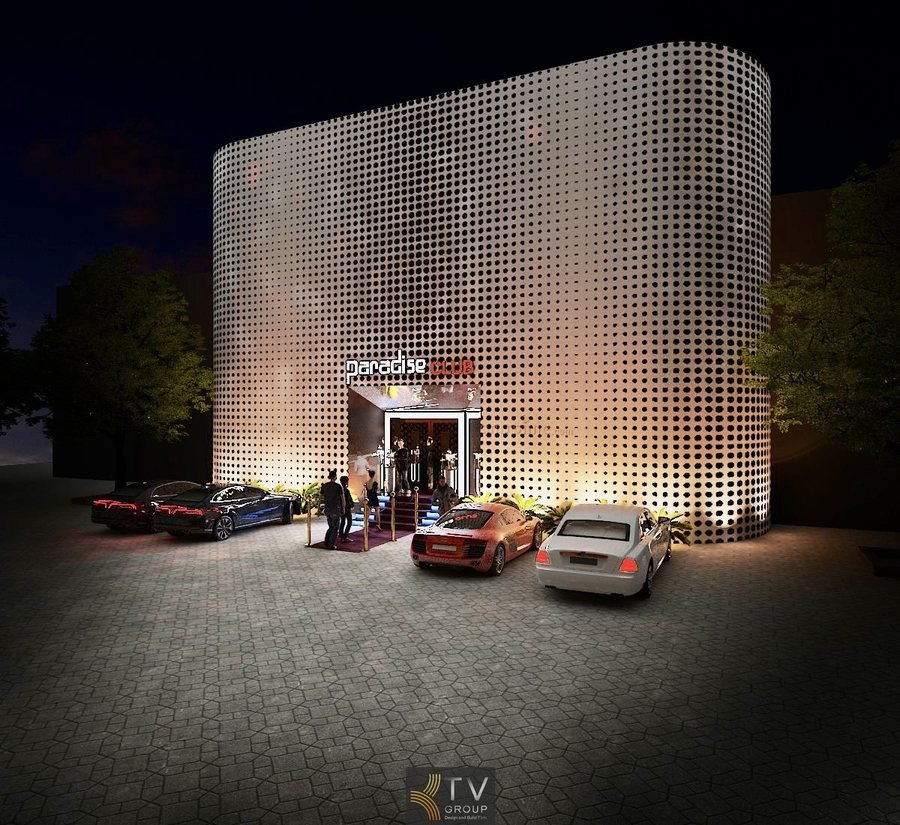 Không gian Bar Lounge sang trọng với ánh sáng xuyên lưới kim loại độc đáo, tạo hiệu ứng thị giác mạnh mẽ.