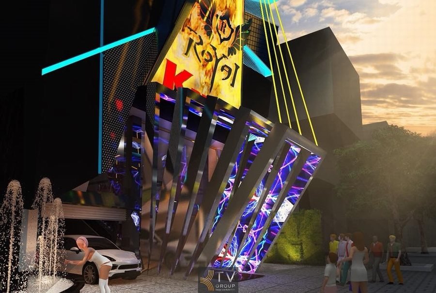 Mẫu thiết kế mặt tiền karaoke sang trọng với ánh sáng LED mạnh mẽ và khối kiến trúc hiện đại.  Ngoại thất karaoke đậm phong cách giải trí cao cấp, thu hút mọi ánh nhìn về đêm. 