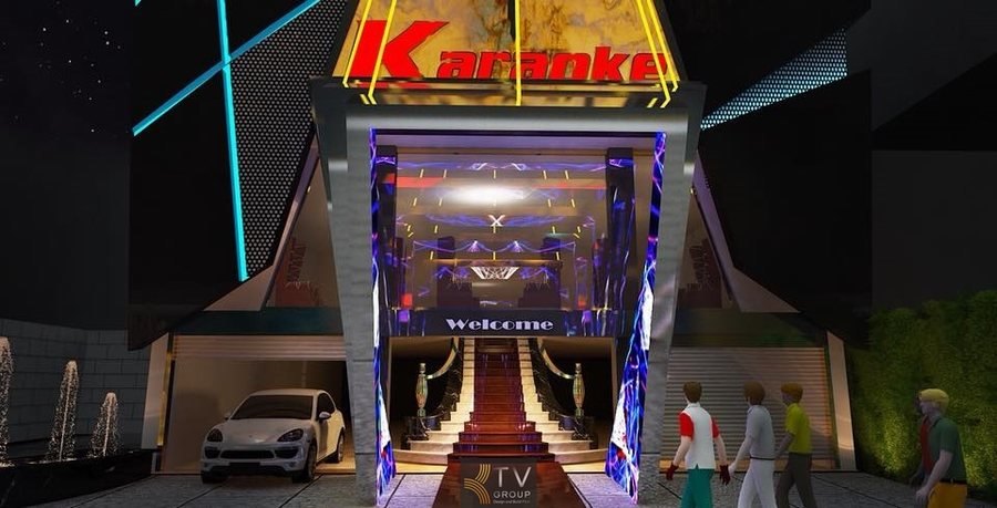 Lối vào karaoke với ánh sáng trang trí hiện đại và mạnh mẽ  Tổng thể kiến trúc Karaoke KTV phong cách hiện đại về đêm 