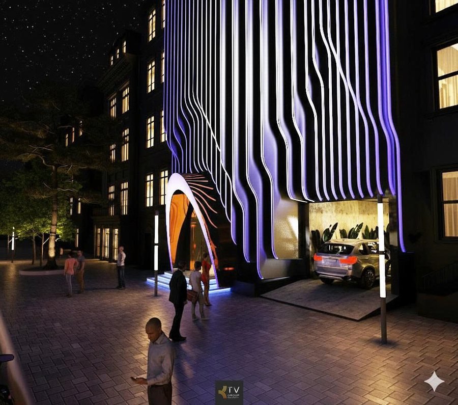 Thiết kế mặt tiền KTV Karaoke nổi bật với hệ lam LED “wave”, cổng vòm cam neon và hiệu ứng ánh sáng mạnh mẽ về đêm. Thi công bởi KTV Group.