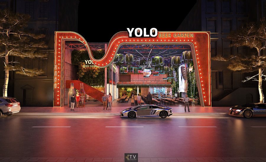 Kiến trúc hiện đại kết hợp cây xanh, thác nước và biểu tượng chai bia lớn tạo nên một phong cách Beer Garden ấn tượng và dễ nhận diện.