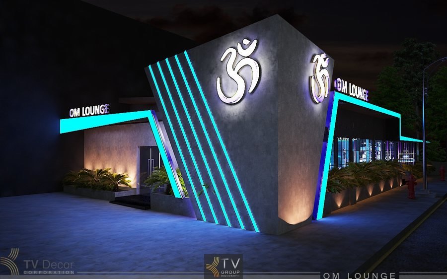 Thiết kế ngoại thất Lounge trong hình thể hiện phong cách hiện đại – sang trọng – nổi bật về ánh sáng, sử dụng kiến trúc hình khối mạnh mẽ và ánh sáng LED màu xanh cyan – tím neon chạy dọc toàn bộ mặt tiền 