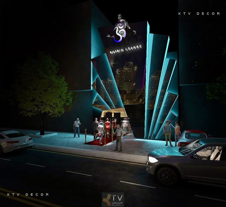 Lối vào thảm đỏ và biểu tượng kim loại lớn tạo nên dấu ấn sang trọng, thu hút mọi ánh nhìn. 