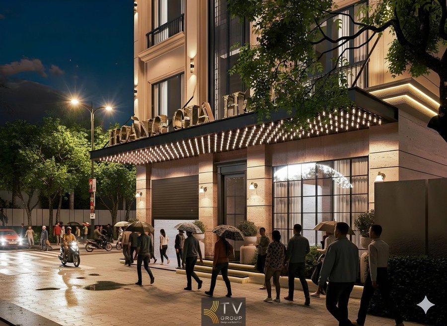 Thiết kế ngoại thất mặt tiền khách sạn Tân Cổ Điển với cửa vòm, ban công cong và hệ thống chiếu sáng ban đêm