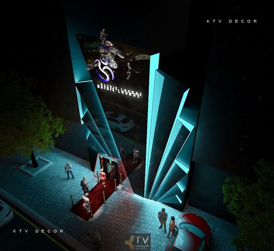 Mặt tiền Lounge được thiết kế theo phong cách tương lai, sử dụng ánh sáng neon và hình khối mạnh mẽ. 