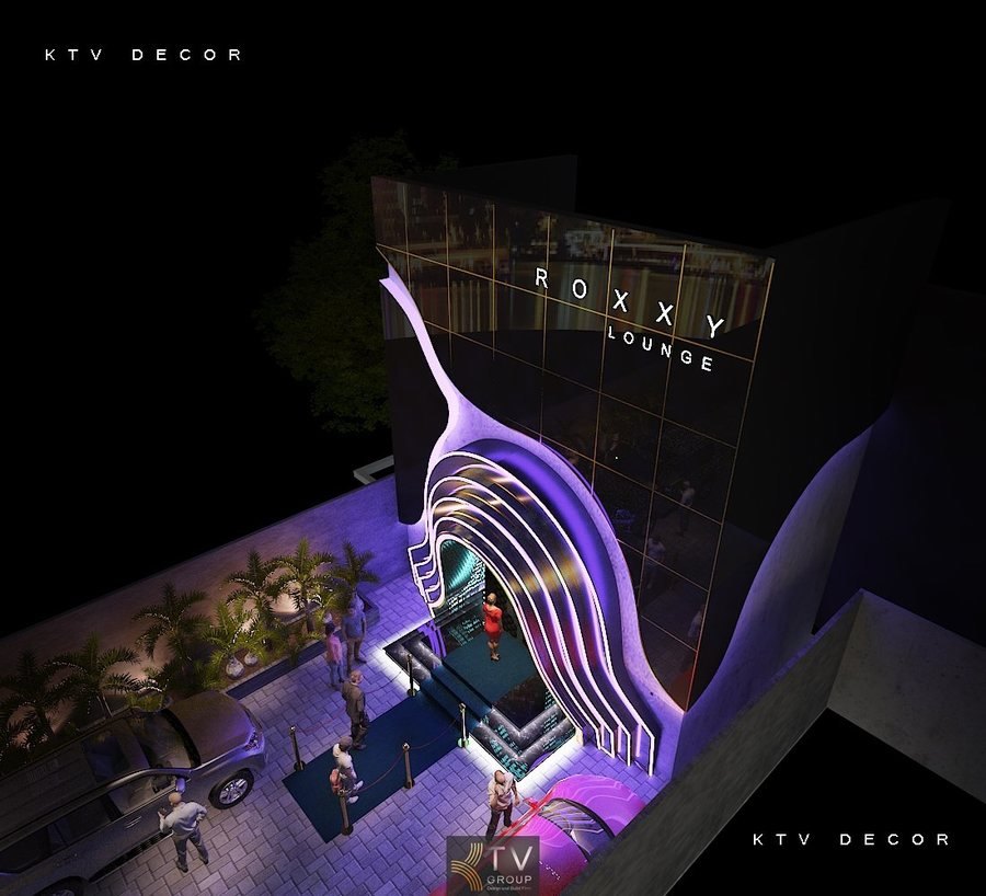 Cấu trúc mặt tiền uốn cong đa lớp tạo nên hiệu ứng thị giác mạnh, như một cổng ánh sáng dẫn vào thế giới nightlife.  Đèn LED dải chạy dọc các đường cong, thay đổi màu sắc linh hoạt, thu hút mọi ánh nhìn khi về đêm.