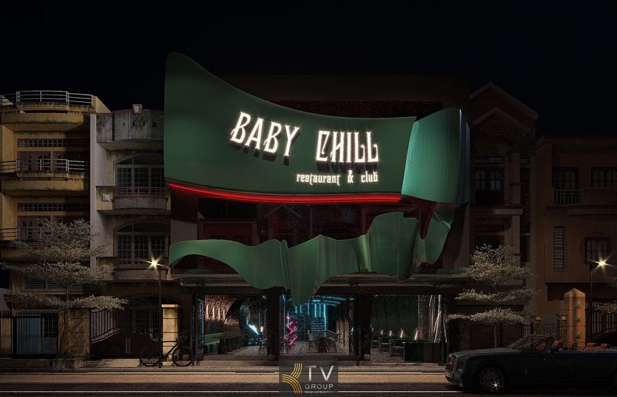 Mặt tiền Baby Chill gây ấn tượng với khối kiến trúc mềm mại và bảng hiệu phát sáng độc đáo. 
