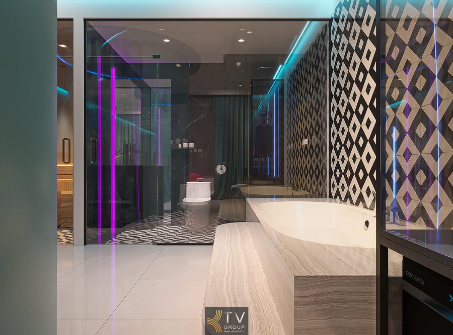 Thiết kế phòng khách sạn cao cấp với nội thất tinh giản, ánh sáng viền và bố cục mở tạo cảm giác rộng và sang trọng Không gian nghỉ dưỡng trong khách sạn với bồn tắm lớn, vách kính và ánh sáng xanh tạo cảm giác thư giãn và thoải mái 