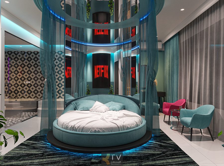 Thiết kế phòng khách sạn mở với khu vệ sinh kính, họa tiết tường hình học và ánh sáng hiện đại nổi bật Nội thất phòng khách sạn cao cấp với ghế thư giãn, bàn nhỏ và ánh sáng nhẹ tạo không gian tiện nghi 