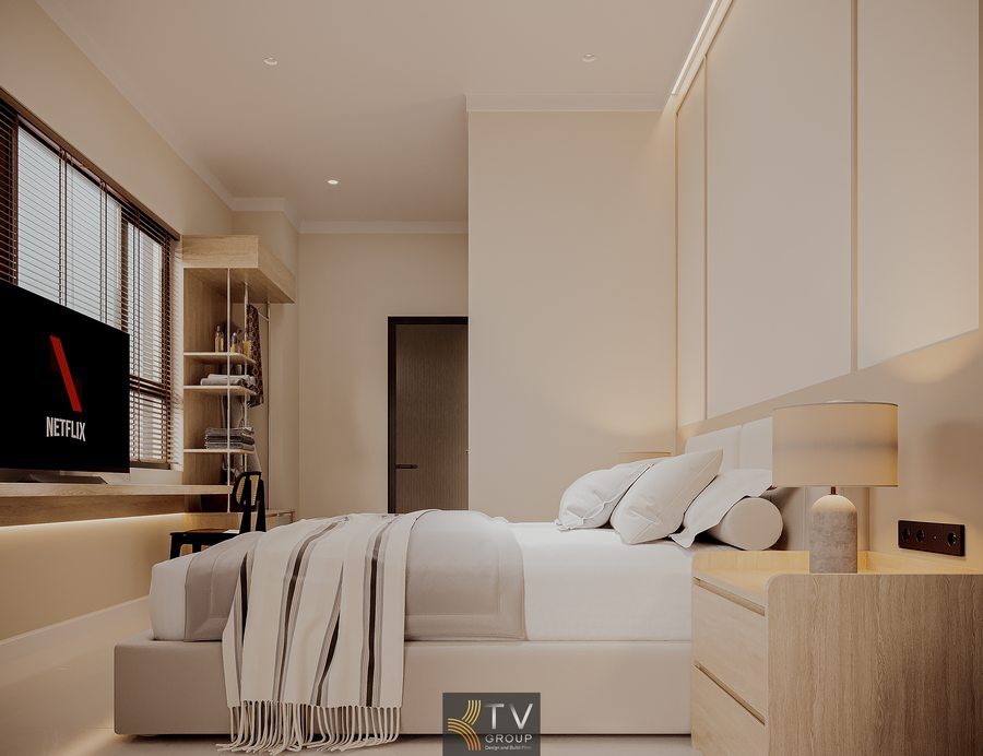 phòng khách sạn đẹp với giường ngủ êm ái kết hợp kệ tivi treo tường và bố trí nội thất gọn gàng tiện nghi 