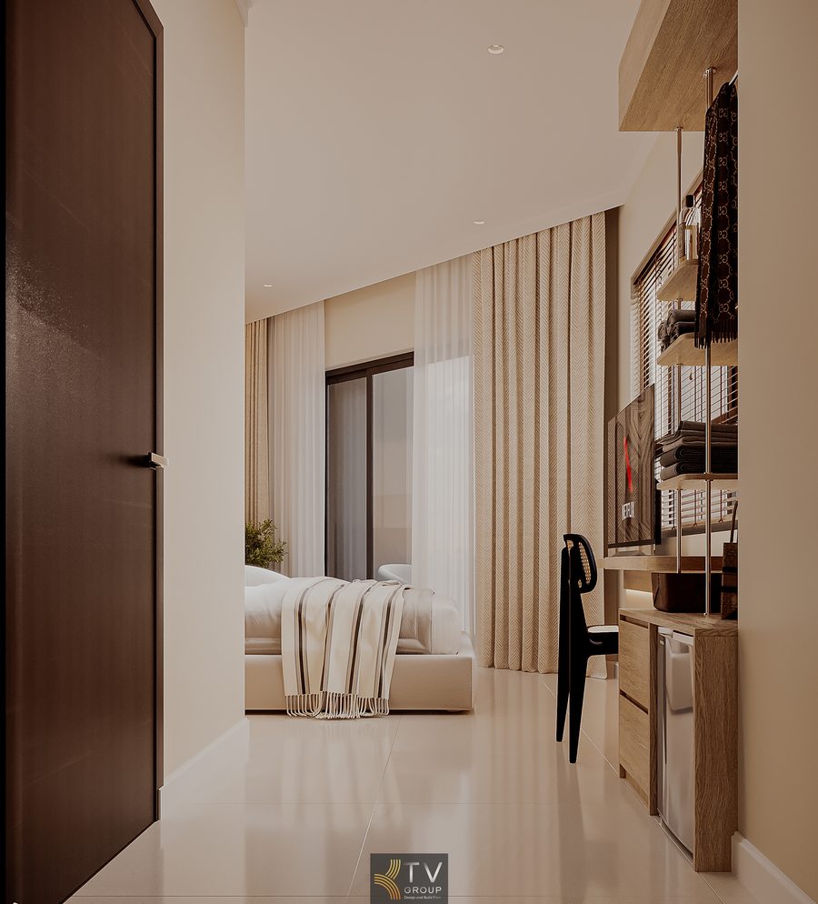 không gian phòng khách sạn tối giản với màu sắc trung tính và ánh sáng dịu nhẹ mang lại cảm giác thư giãn thiết kế nội thất phòng khách sạn với tủ mở tiện lợi và bàn làm việc nhỏ phù hợp khách công tác 