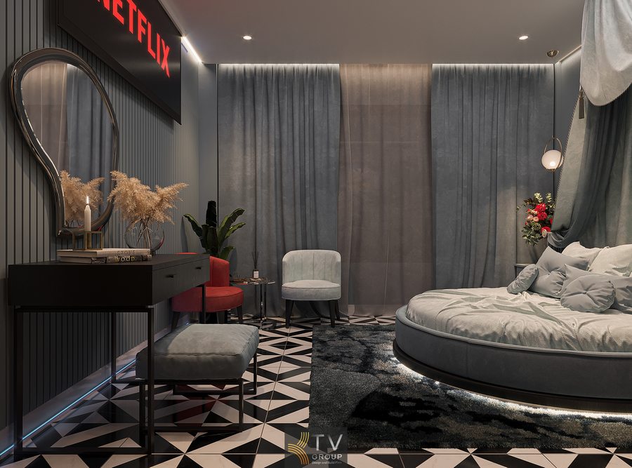 phòng khách sạn thiết kế nghệ thuật với giường ngủ mềm mại rèm vải nhẹ nhàng và ánh sáng dịu tạo nên không gian ấm cúng và sang trọng