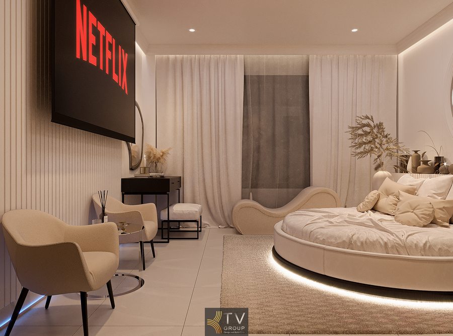 Nội thất phòng khách sạn tông kem nhẹ nhàng, bố cục cân đối, ánh sáng gián tiếp giúp tăng trải nghiệm nghỉ dưỡng