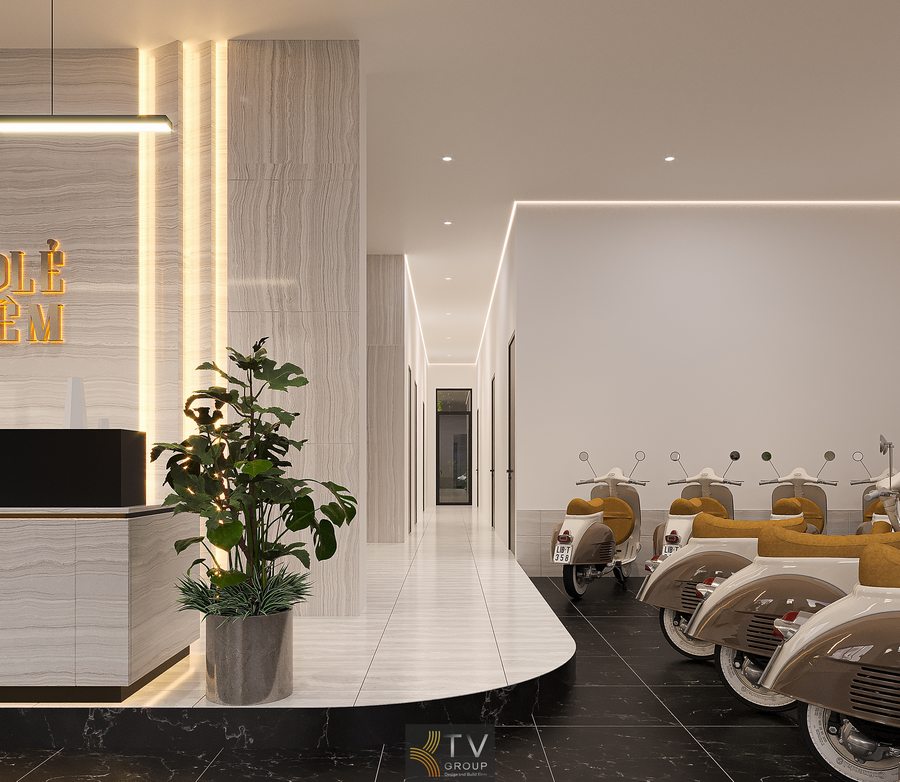 Thiết kế khu vực tiếp khách khách sạn với ánh sáng ấm, nội thất tối giản và không gian rộng thoáng