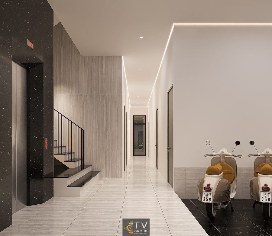 Sảnh khách sạn với quầy lễ tân trung tâm, ánh sáng LED hắt tường và vật liệu cao cấp tạo cảm giác chuyên nghiệp