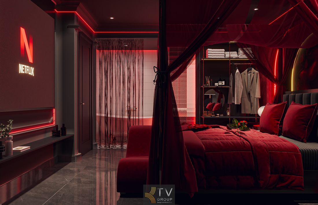 Thiết kế phòng khách sạn với giường trung tâm, ánh sáng đỏ chủ đạo và hệ đèn nghệ thuật giúp tạo điểm nhấn mạnh và thu hút khách hàng trẻ 