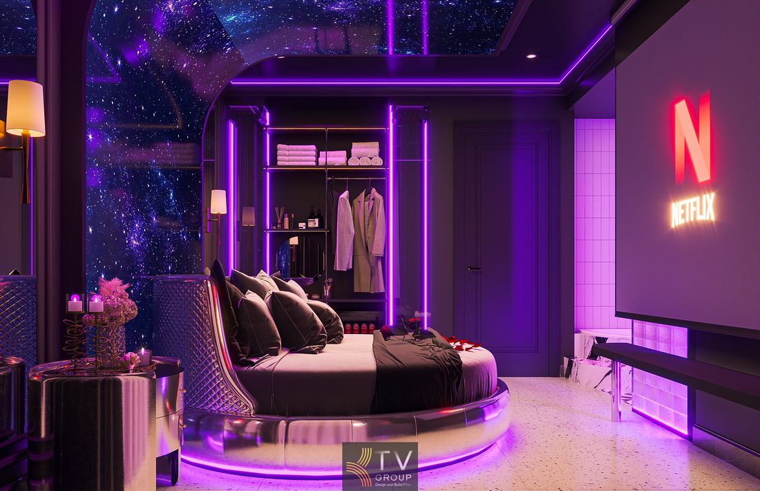 Thiết kế nội thất phòng khách sạn phong cách tương lai với trần sao galaxy, hệ đèn neon tím và bố cục mở tối ưu diện tích, mang lại trải nghiệm lưu trú ấn tượng 