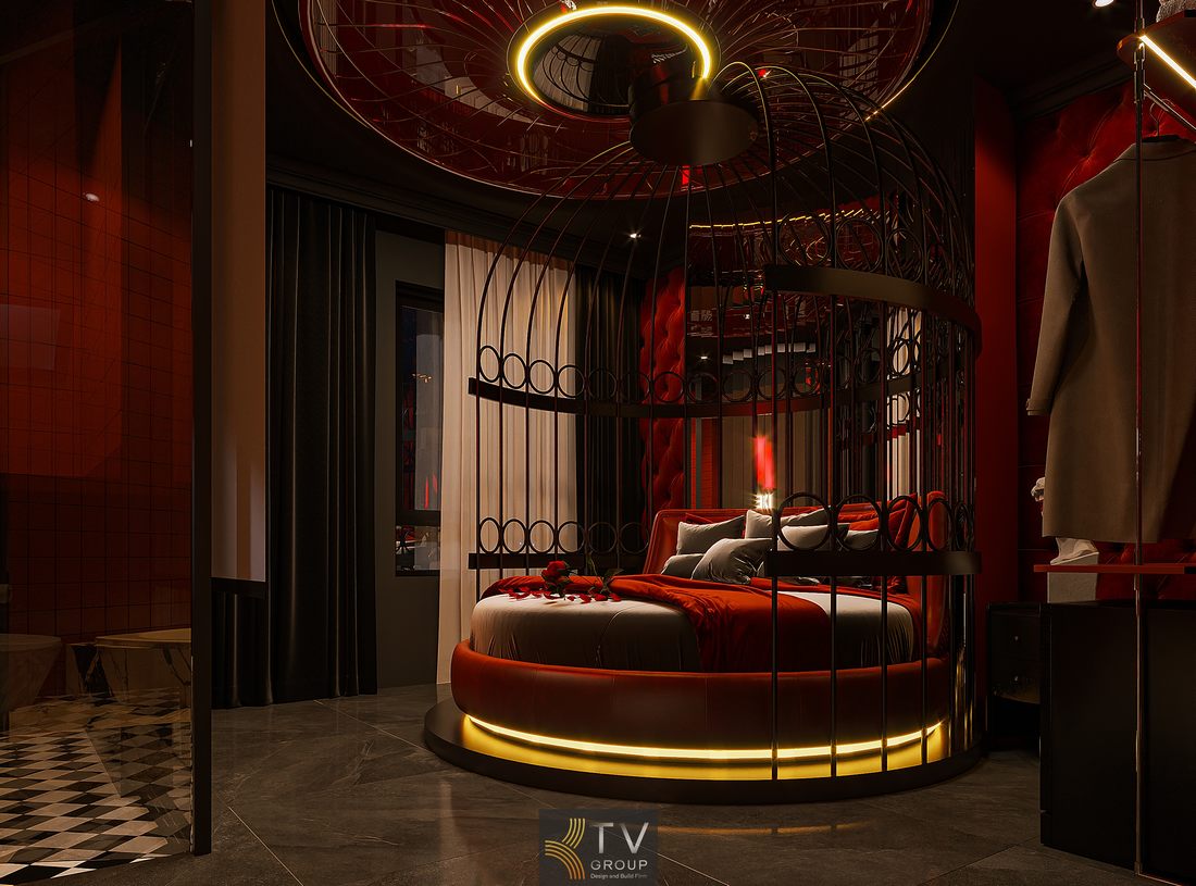 nội thất phòng khách sạn concept ánh sáng đỏ với giường tròn và hệ trần trang trí giúp không gian trở nên nổi bật và khác biệt