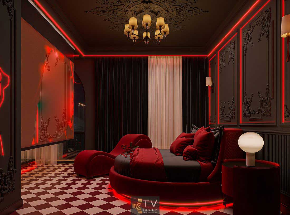 Thiết kế phòng khách sạn tông đen đỏ với ánh sáng LED tạo hiệu ứng không gian mạnh mẽ, hiện đại và thu hút ánh nhìn ngay từ lần đầu trải nghiệm 