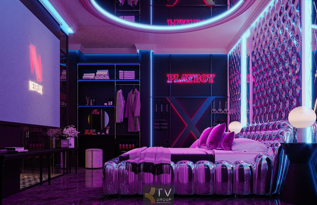 Thiết kế phòng khách sạn concept ánh sáng neon với tông màu tím hồng chủ đạo, nội thất bọc da bóng, tường họa tiết nổi và hệ trần LED mang phong cách hiện đại, khác biệt và đầy tính trải nghiệm.